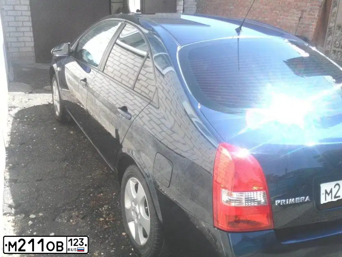 Фото автомобиля NISSAN PRIMERA, 2005 — госномер А667ОУ01. Цвет: ТЕМНО-СИНИЙ