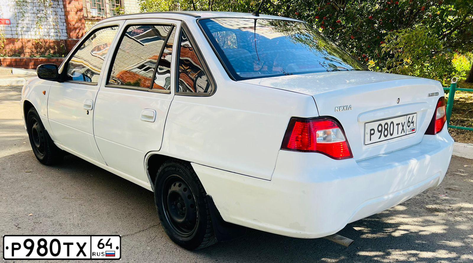 Фото автомобиля LADA 2110, 2002 — госномер Р980ТХ64. Цвет: СЕРЕБРИСТЫЙ СЕРО-ЗЕЛЕНЫЙ