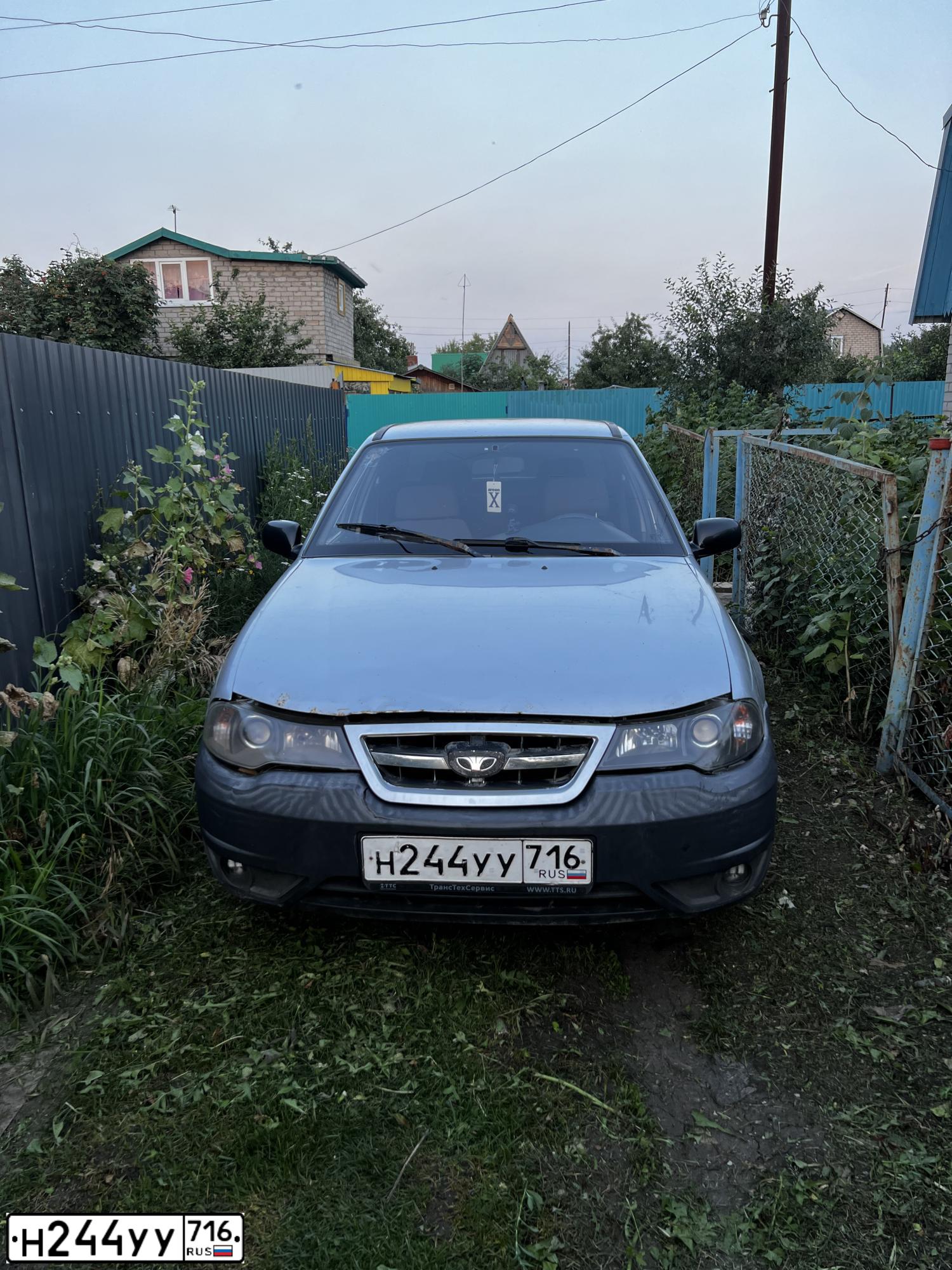 Фото автомобиля DAEWOO NEXIA, 2011 — госномер Н244УУ716. Цвет: Серебристый