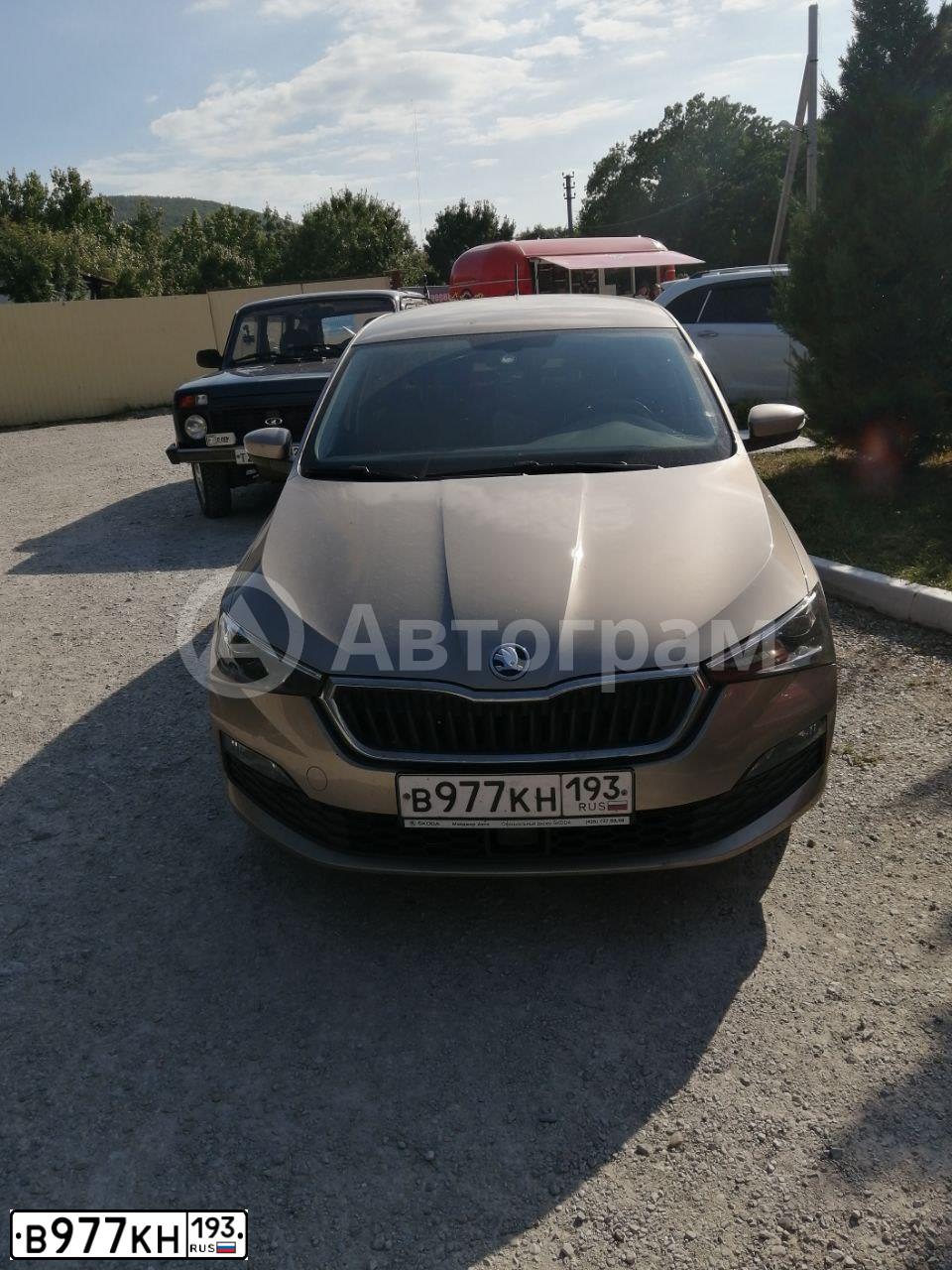 Фото автомобиля SKODA RAPID, 2020 — госномер В977КН193. Цвет: Коричневый
