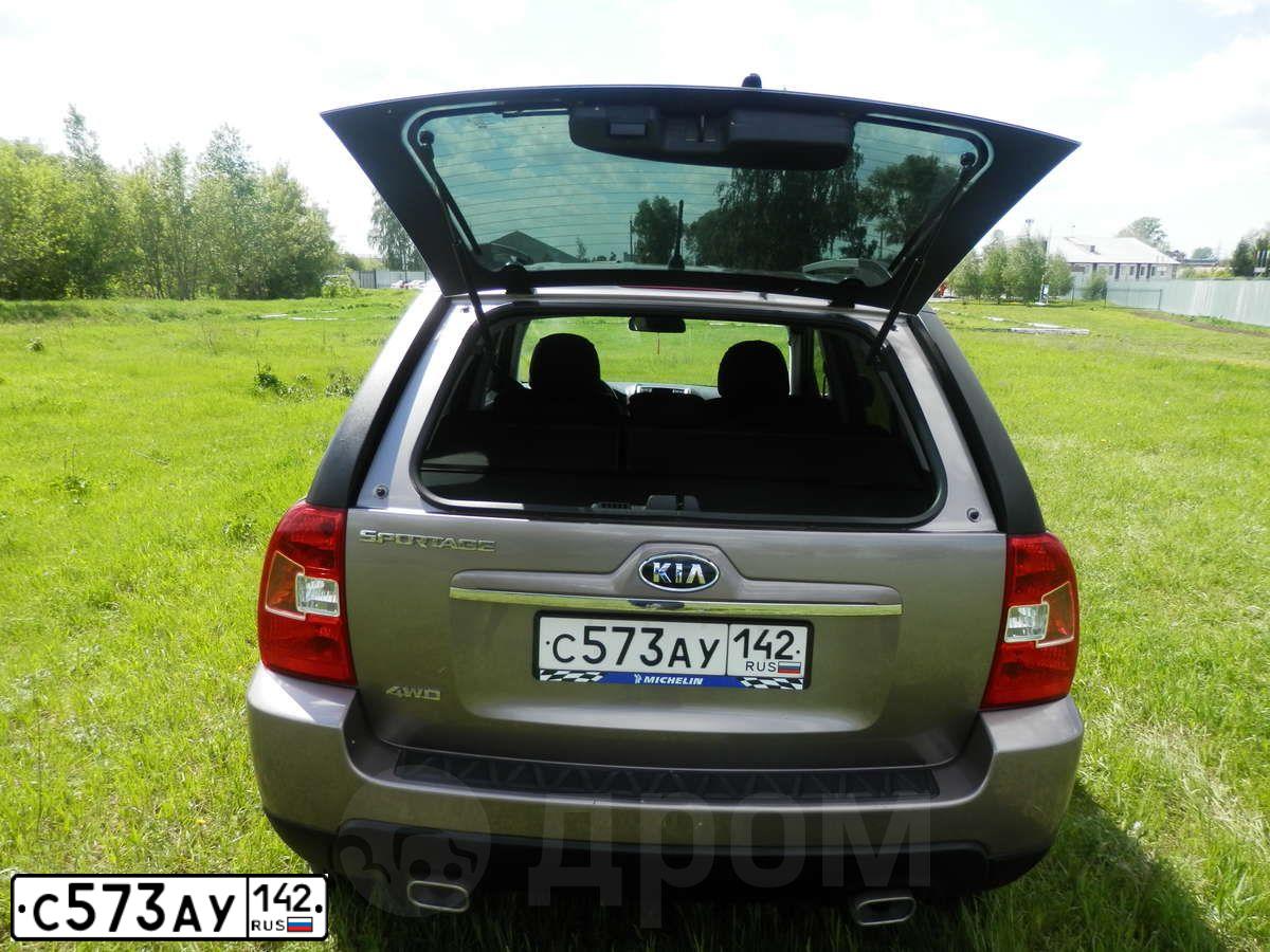 Фото автомобиля KIA SPORTAGE, 2009 — госномер С573АУ142. Цвет: БЕЖЕВЫЙ