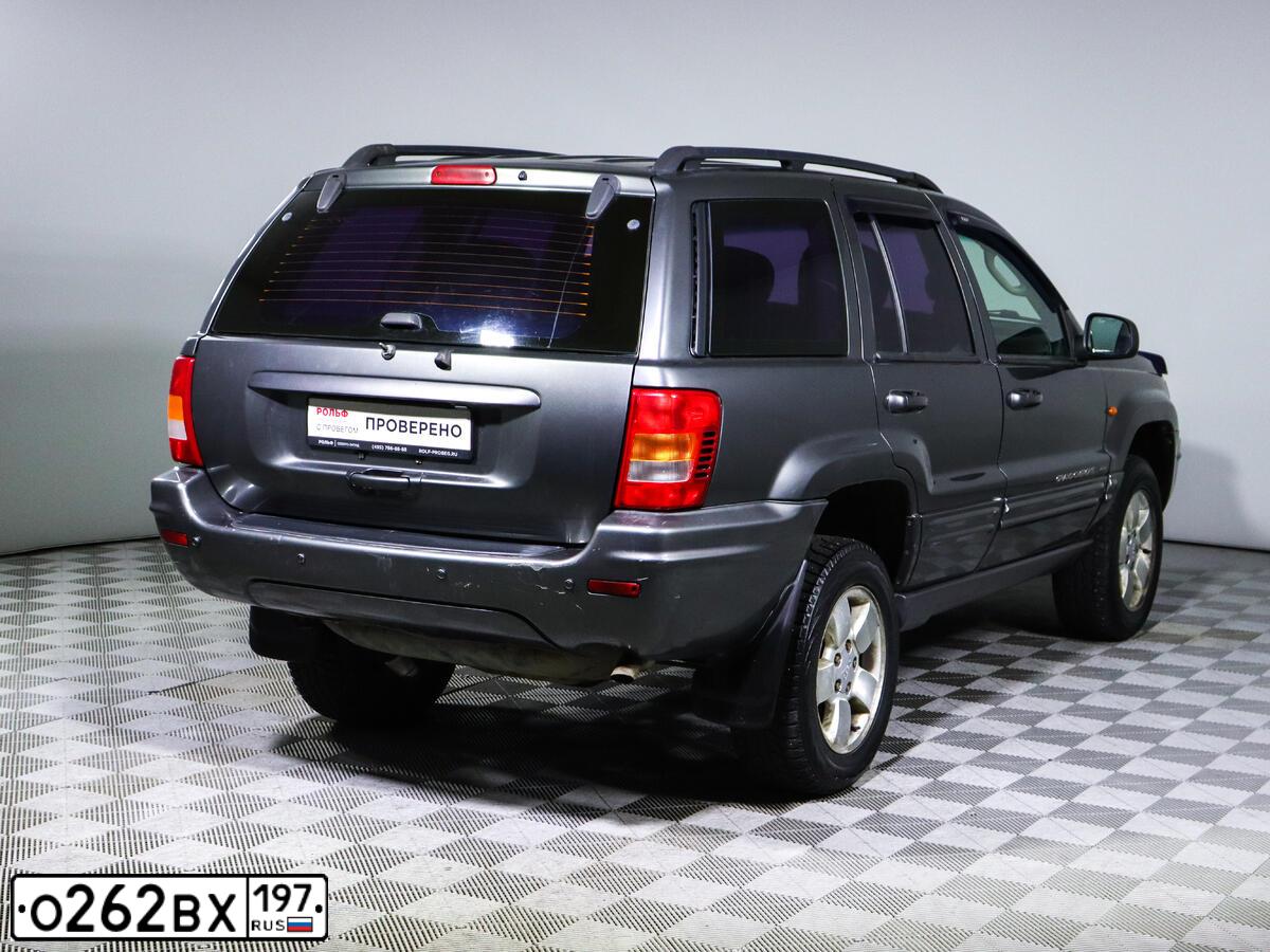 Фото автомобиля JEEP GRAND CHEROKEE, 2004 — госномер С602ТК40. Цвет: СЕРЫЙ