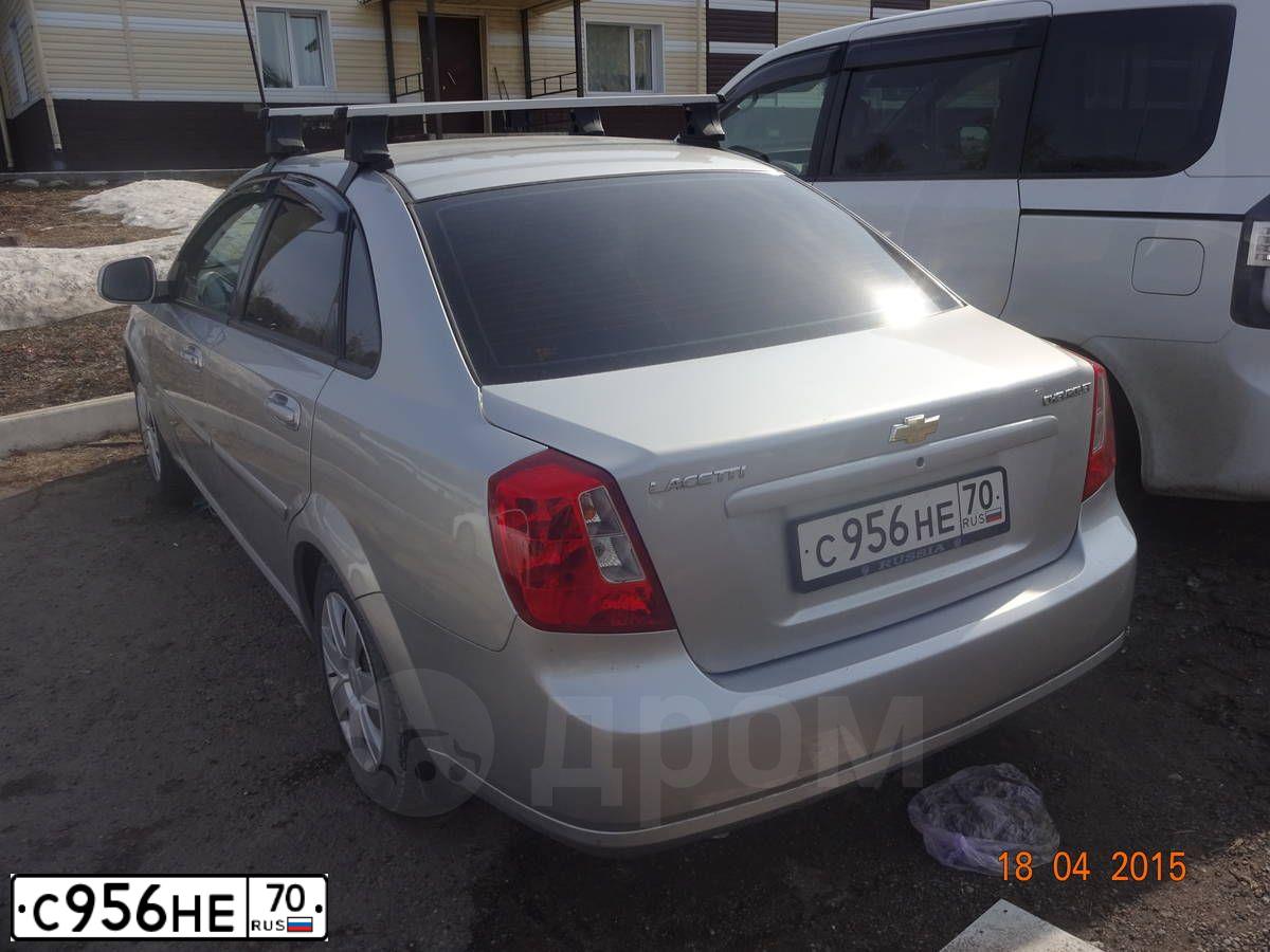 Фото автомобиля CHEVROLET LACETTI, 2011 — госномер С956НЕ70. Цвет: СЕРЕБРИСТЫЙ