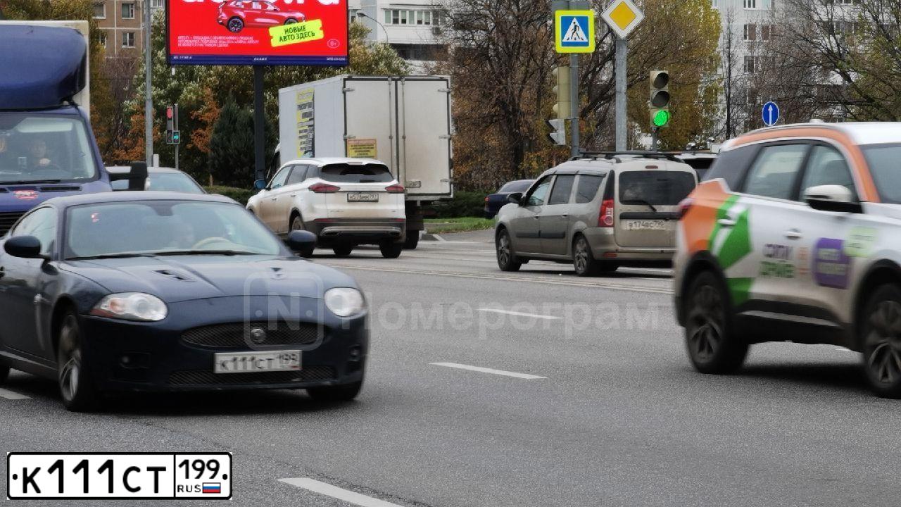 Фото автомобиля JAGUAR XKR-SERIE, 2007 — госномер К111СТ199. Цвет: ТЕМНО-СИНИЙ
