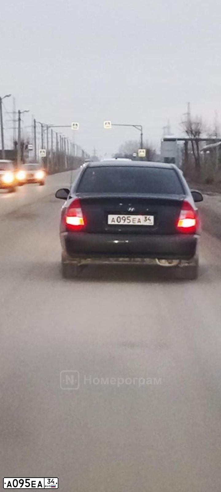 Фото автомобиля TAGAZ ACCENT, 2009 — госномер А095ЕА34. Цвет: ЧЕРНЫЙ