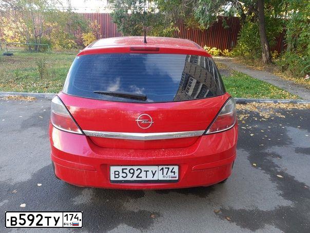 Фото автомобиля OPEL ASTRA, 2007 — госномер В592ТУ174. Цвет: КРАСНЫЙ