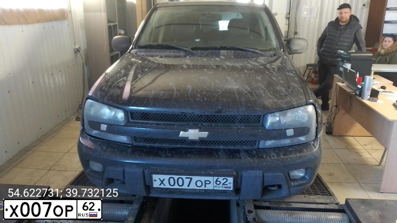 Фото автомобиля CHEVROLET LACETTI, 2009 — госномер Х007ОР62. Цвет: Белый