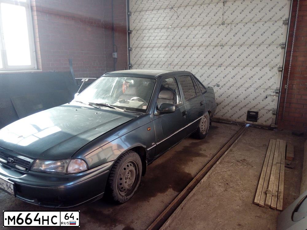 Фото автомобиля DAEWOO NEXIA, 1998 — госномер К004КТ64. Цвет: ЗЕЛЕНЫЙ