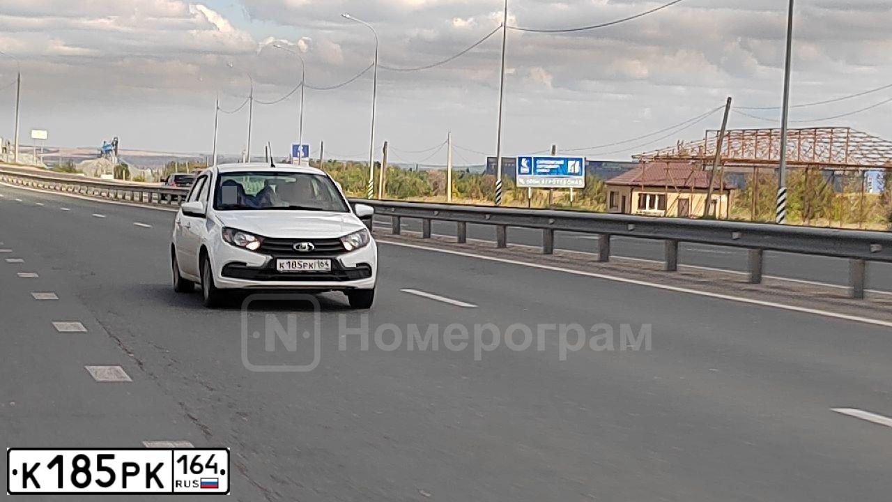 Фото автомобиля VAZ LADA GRANTA 219040, 2023 — госномер К185РК164. Цвет: Белый