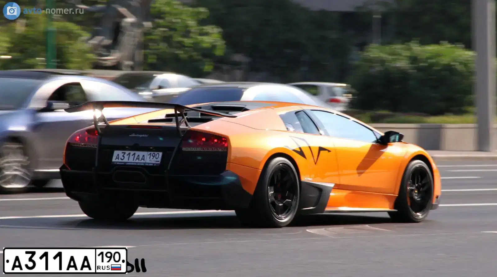 Фото автомобиля LAMBORGHINI MURCIELAGO, 2009 — госномер А311АА190. Цвет: Оранжевый