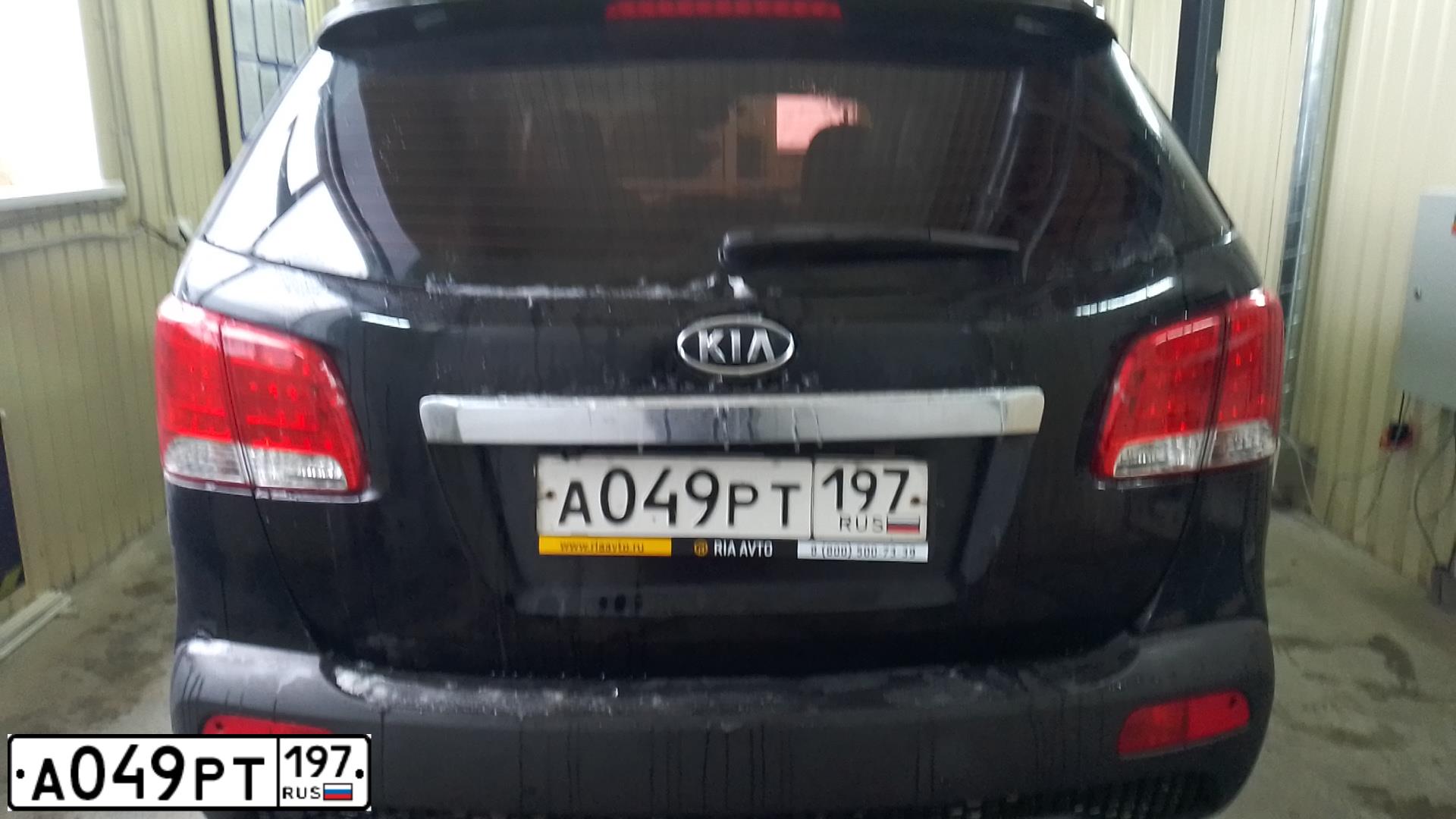 Фото автомобиля KIA SORENTO, 2011 — госномер Т856КХ05. Цвет: ЧЕРНЫЙ