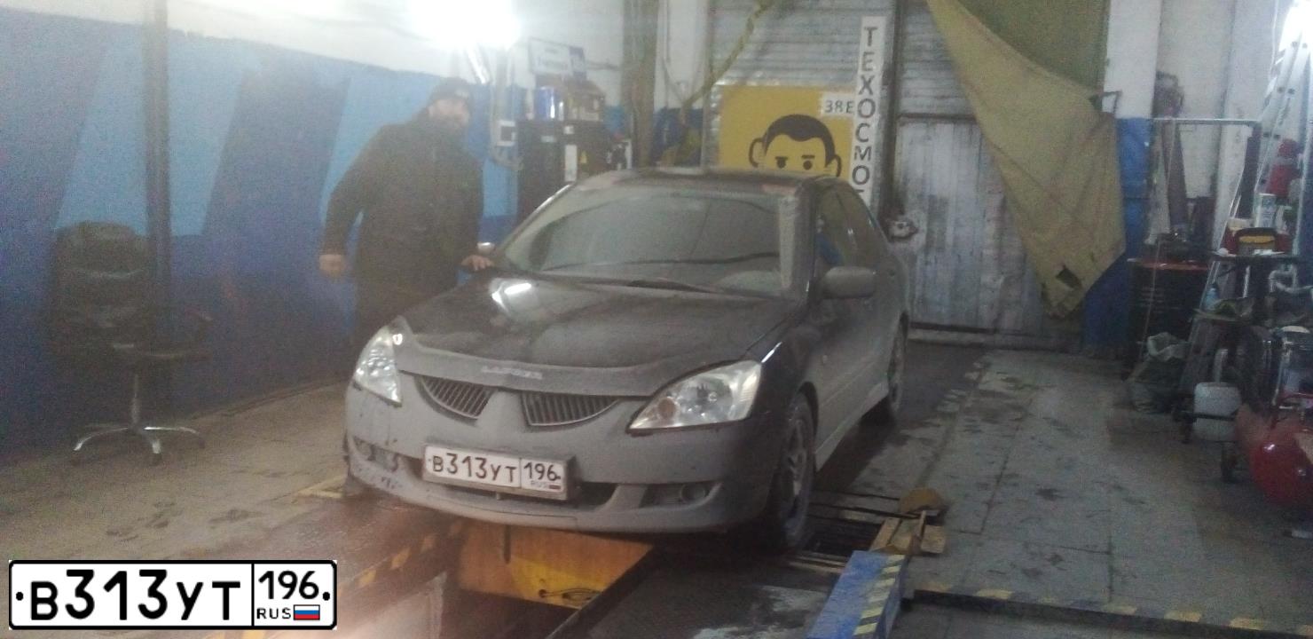 Фото автомобиля MITSUBISHI LANCER, 2004 — госномер В313УТ196. Цвет: ЧЕРНЫЙ