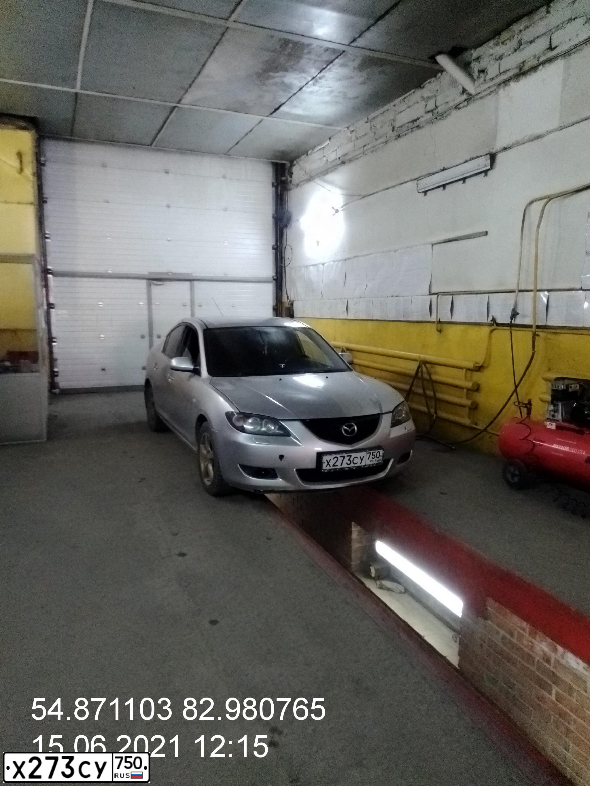 Фото автомобиля MAZDA A 3, 2004 — госномер К877ХА154. Цвет: Серый