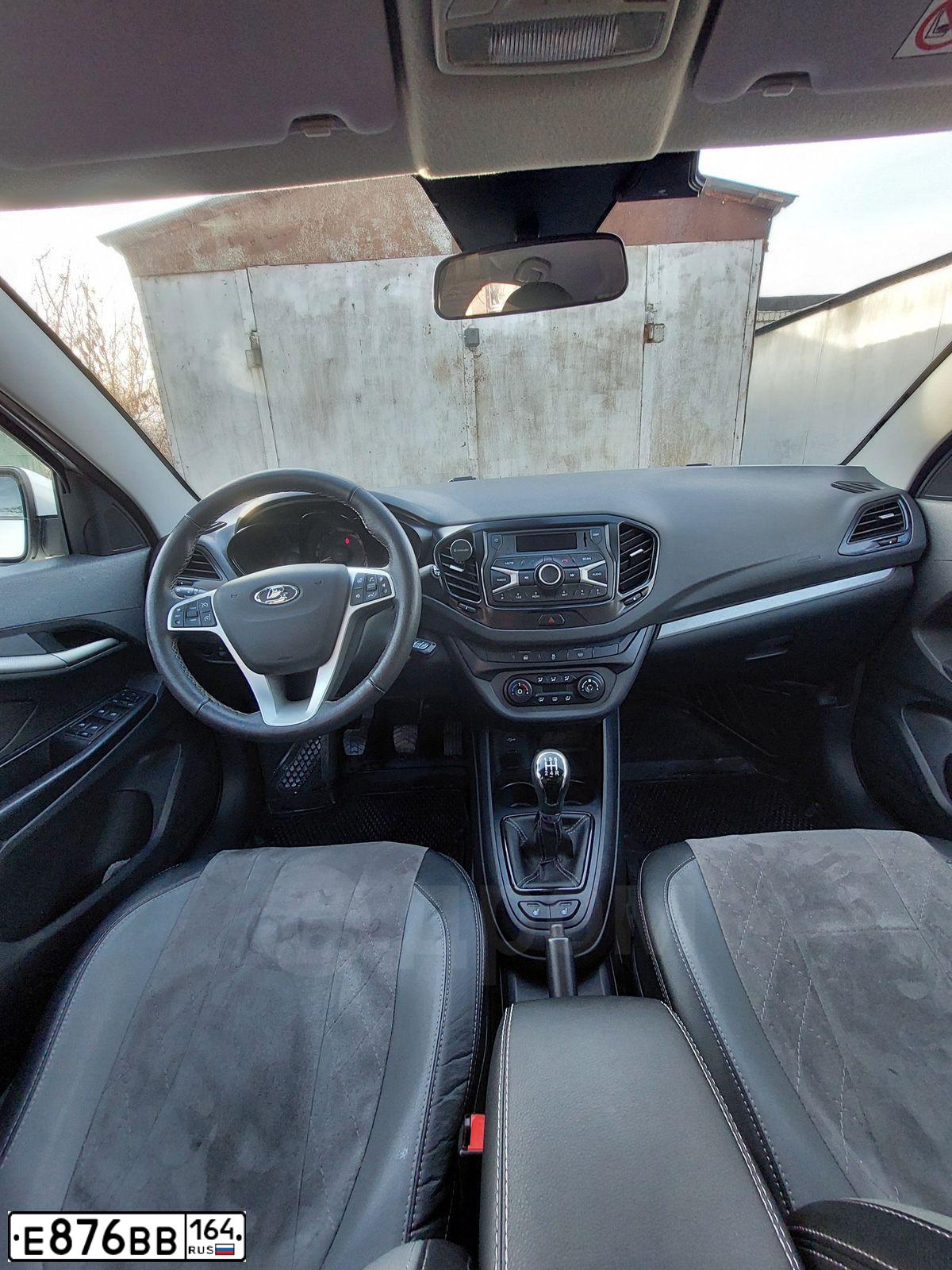 Фото автомобиля LADA VESTA, 2020 — госномер Е876ВВ164. Цвет: Белый