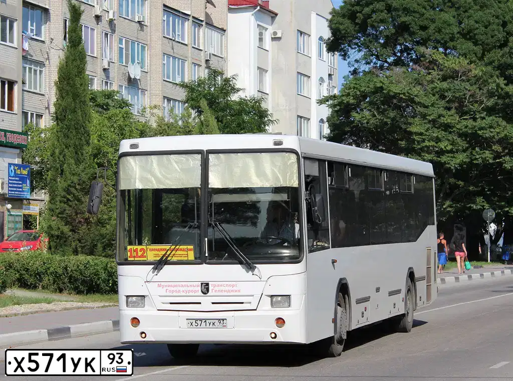 Фото автомобиля NEFAZ 5299 /KAMAZ 5297 4X2/, 2010 — госномер Х571УК93. Цвет: Белый