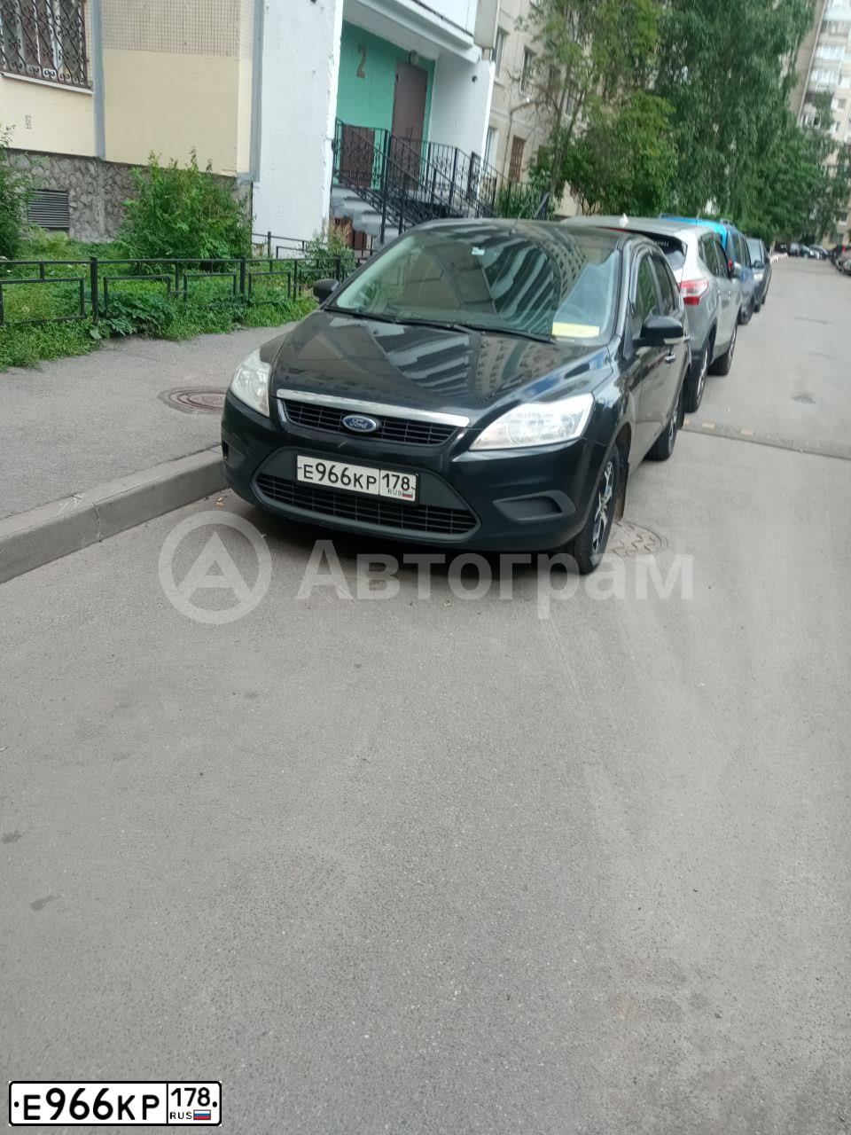 Фото автомобиля FORD FOCUS, 2011 — госномер Е966КР178. Цвет: ЧЕРНЫЙ