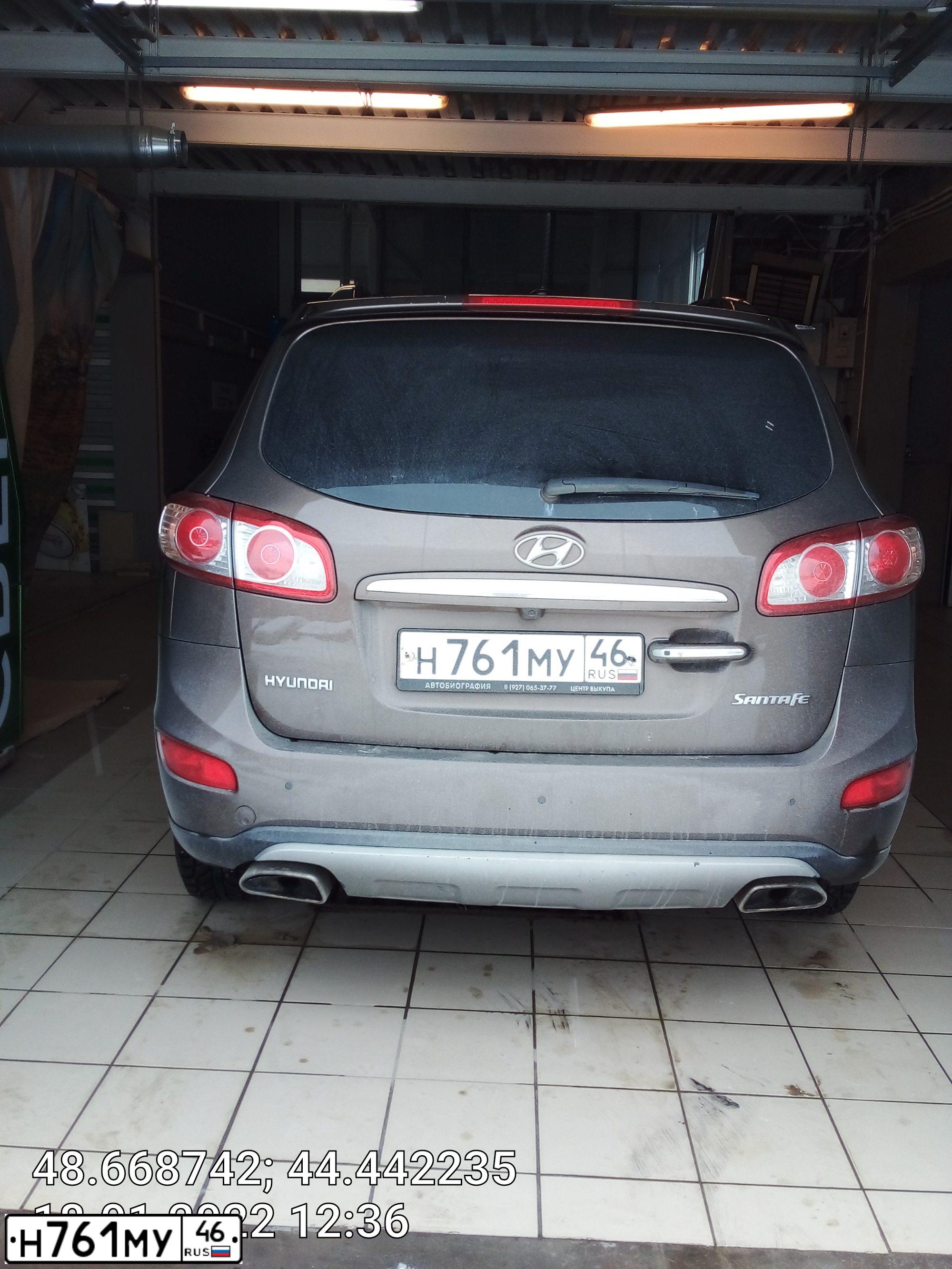 Фото автомобиля HYUNDAI SANTA FE, 2011 — госномер К937РС134. Цвет: Коричневый