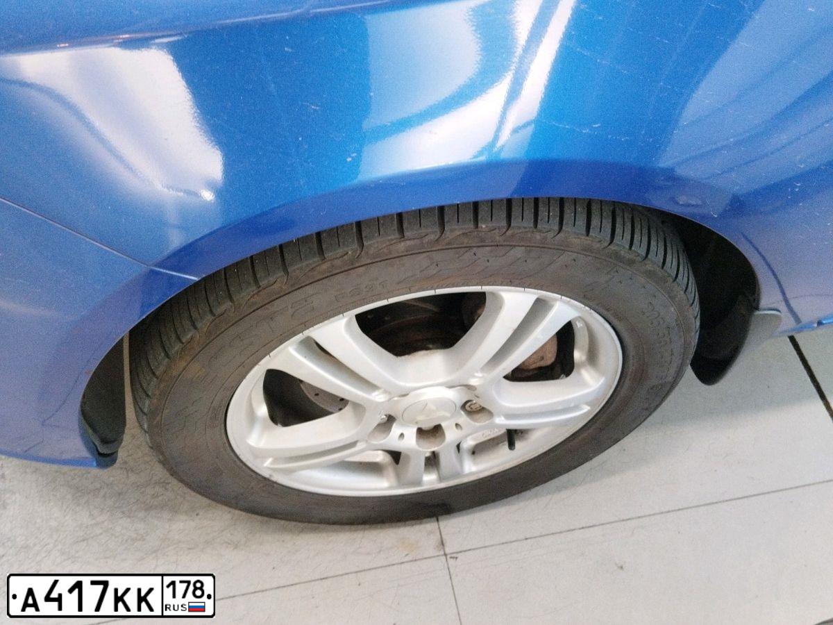 Фото автомобиля KIA CERATO, 2010 — госномер Е077НМ147. Цвет: синий