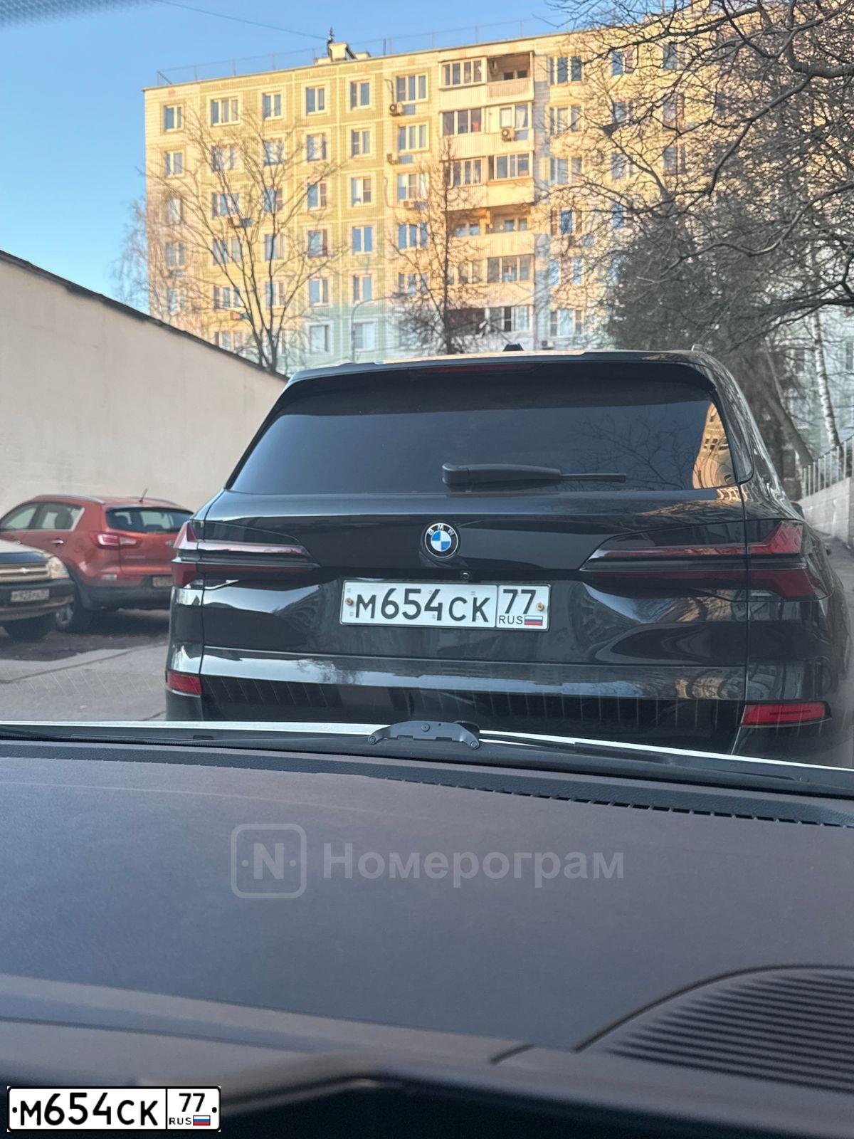 Фото автомобиля FORD MONDEO, 1993 — госномер М654СК77. Цвет: КРАСНЫЙ МЕТАЛЛИК