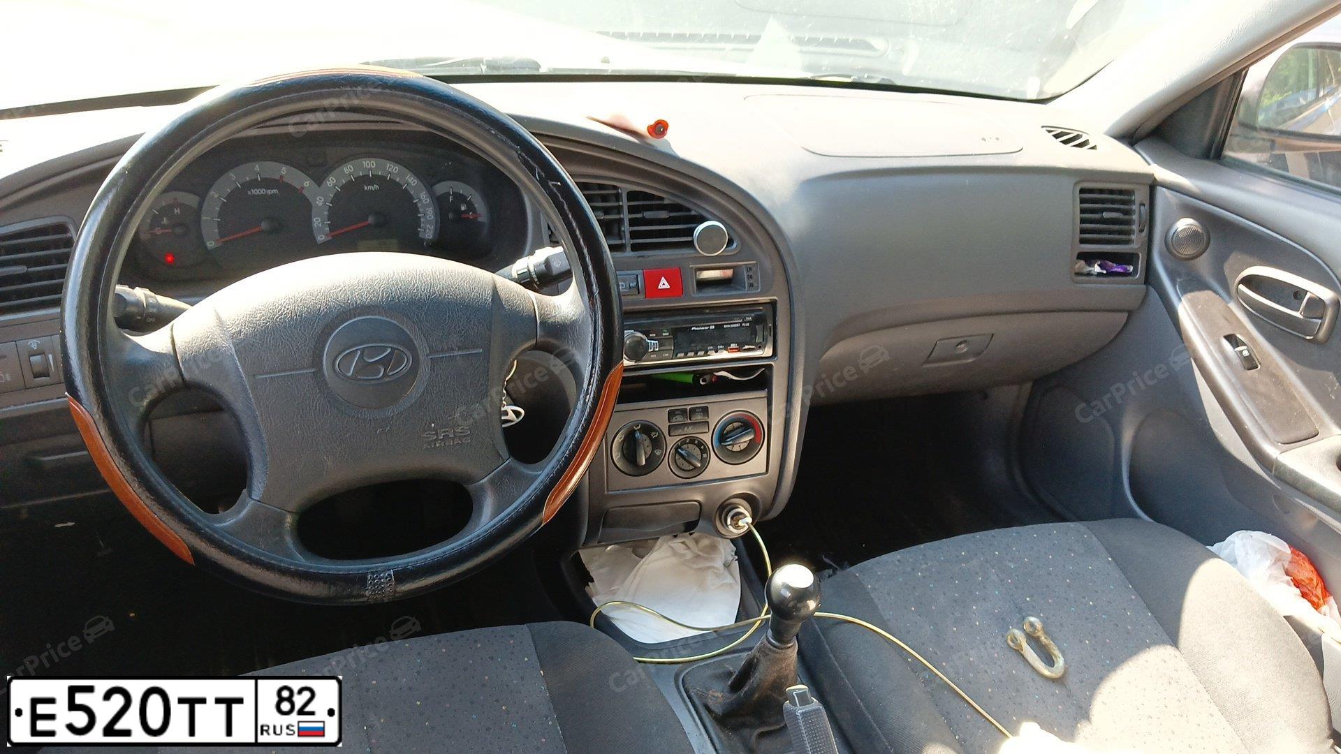 Фото автомобиля HYUNDAI ELANTRA, 2001 — госномер Е039АУ977. Цвет: БЕЖЕВЫЙ
