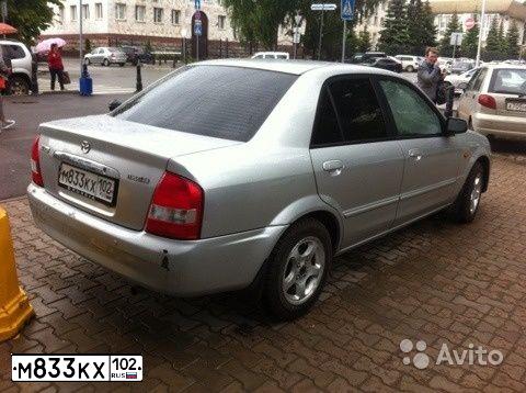 Фото автомобиля MAZDA 323, 2001 — госномер С280РВ716. Цвет: Серый