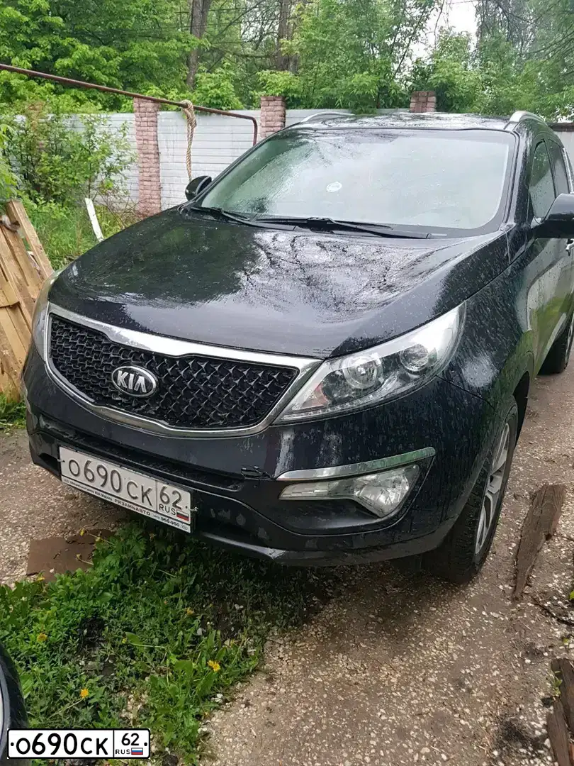 Фото автомобиля KIA SPORTAGE, 2014 — госномер О690СК62. Цвет: ЧЕРНЫЙ ПЕРЛАМУТР