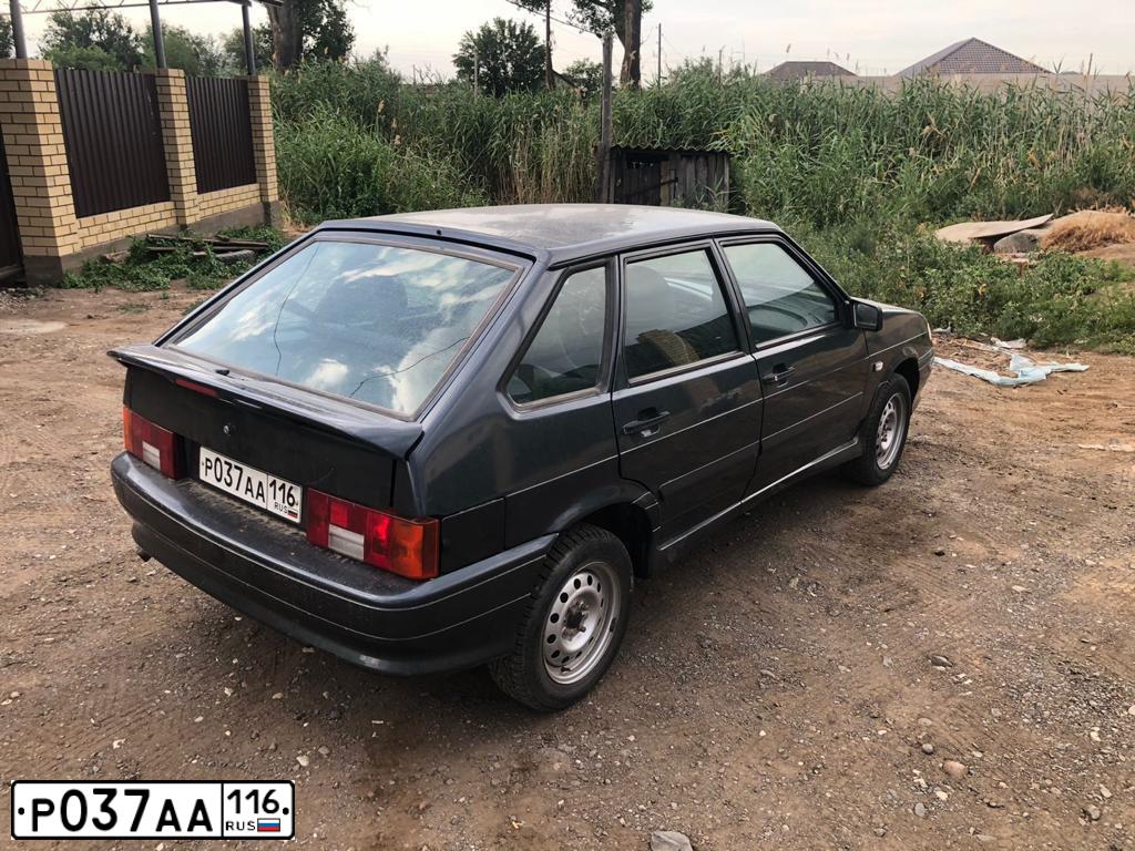 Фото автомобиля LADA 2114, 2012 — госномер В655НН30. Цвет: Серо-Синий