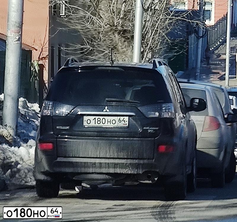 Фото автомобиля MITSUBISHI LANCER, 2004 — госномер Х528АН64. Цвет: СЕРЫЙ