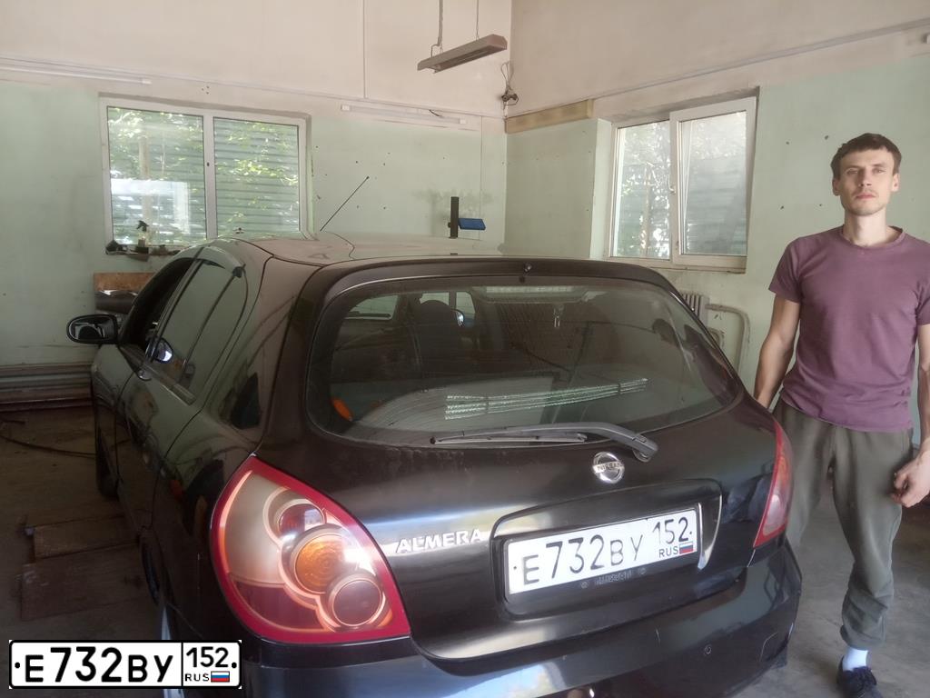 Фото автомобиля NISSAN ALMERA, 2005 — госномер Е732ВУ152. Цвет: ЧЕРНЫЙ