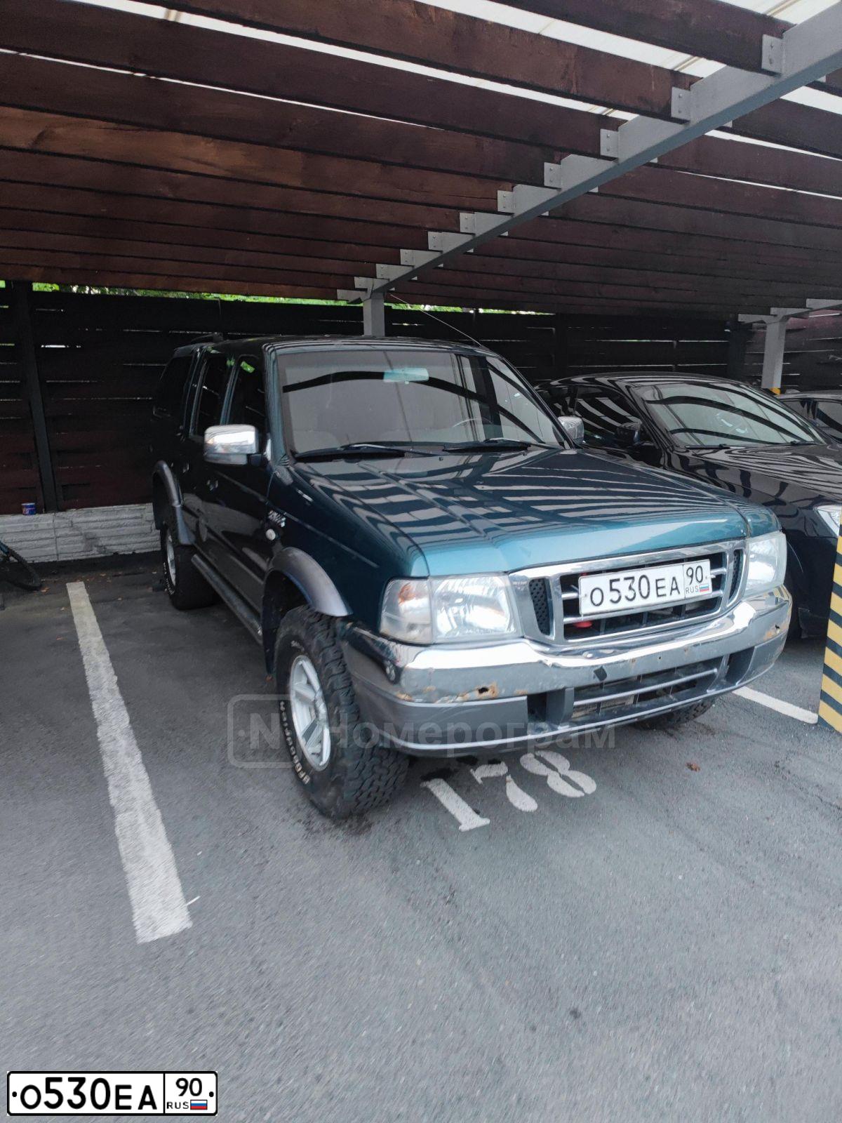 Фото автомобиля FORD RANGER, 2005 — госномер О530ЕА90. Цвет: ЗЕЛЕНЫЙ ТЕМНЫЙ