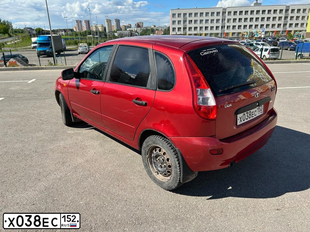 Фото автомобиля LADA 1119 KALINA, 2010 — госномер Х038ЕС152. Цвет: СЕРЕБРИСТО-КРАСНЫЙ