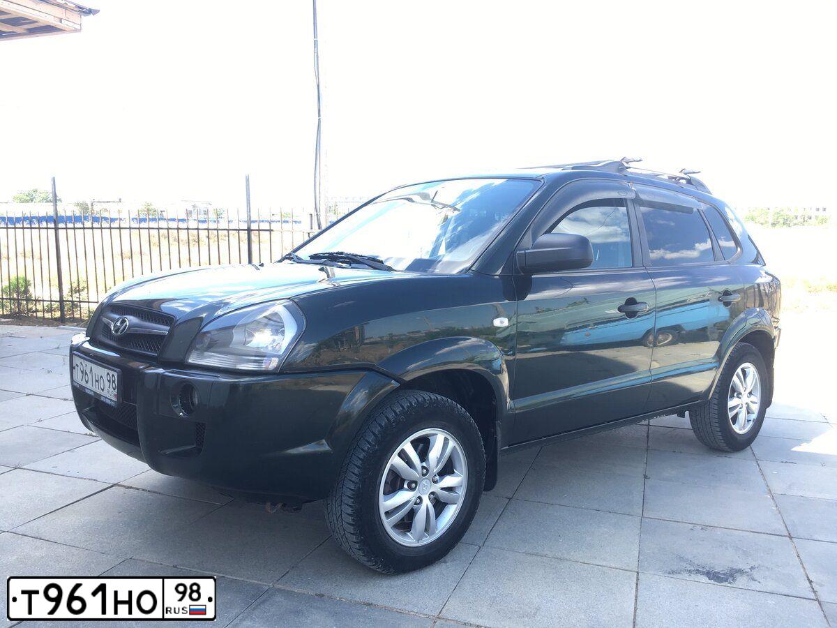 Фото автомобиля HYUNDAI TUCSON, 2008 — госномер К415ТВ82. Цвет: Темно-зеленый