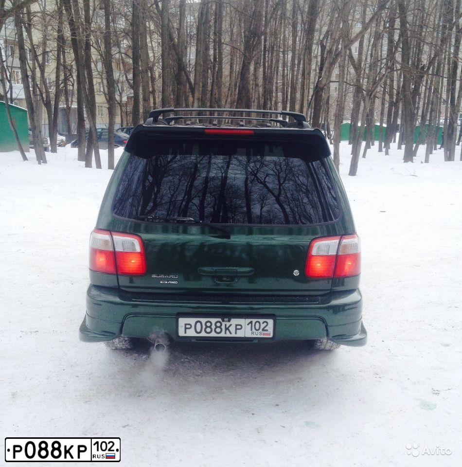 Фото автомобиля MITSUBISHI LANCER, 2013 — госномер М919ОХ702