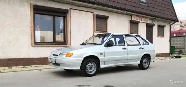 Фото автомобиля LADA 2114 SAMARA, 2006 — госномер Н502ТХ198. Цвет: МОЛОЧНО-БЕЛЫЙ СЕРЕБРИСТЫЙ