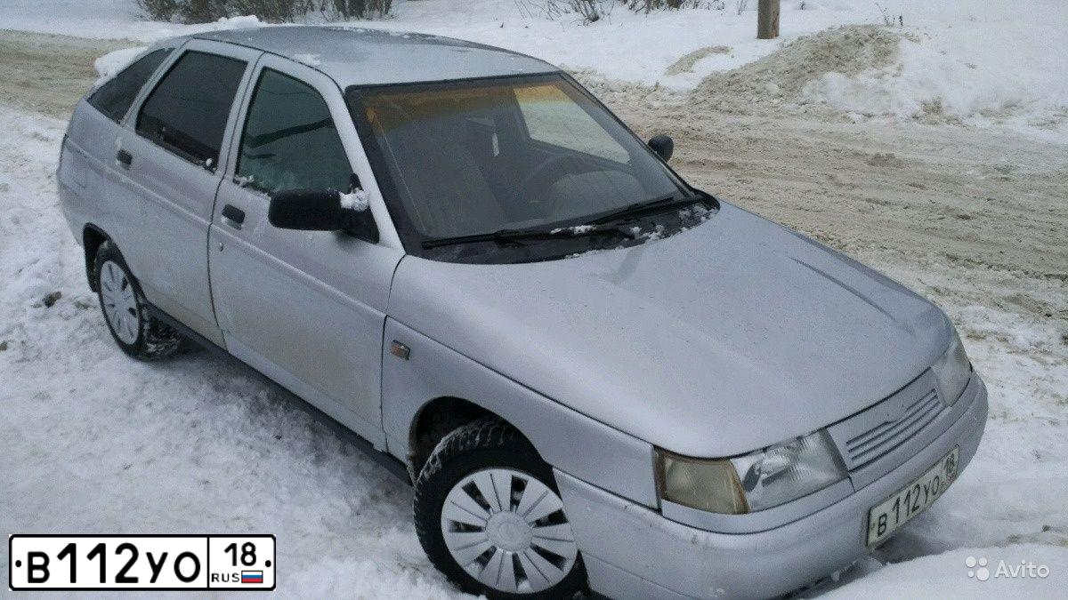 Фото автомобиля LADA 2112, 2004 — госномер В112УО18. Цвет: СВЕТЛО-СЕРЕБР  МЕТАЛ