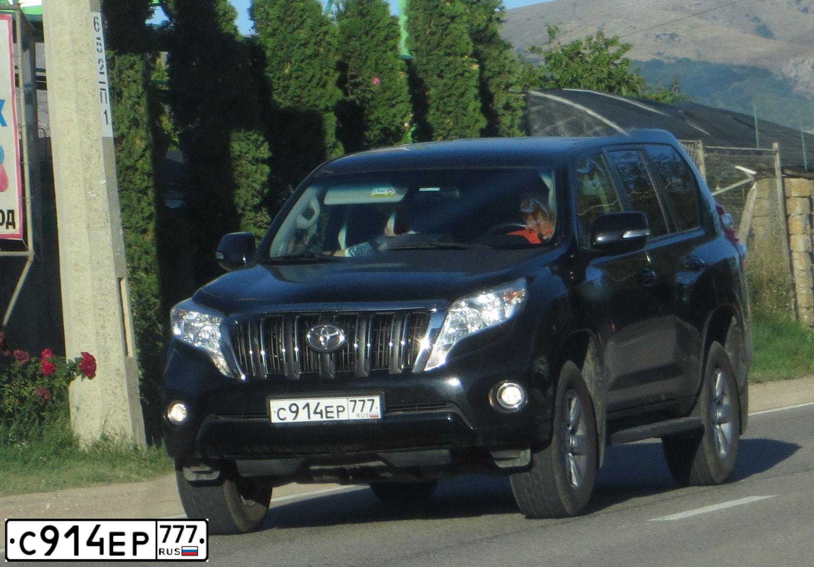 Фото автомобиля TOYOTA LANDCRUISER, 2015 — госномер К059АТ82. Цвет: ЧЕРНЫЙ