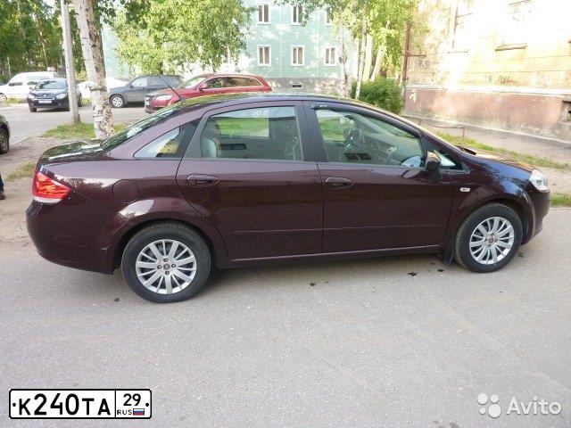 Фото автомобиля FIAT LINEA, 2011 — госномер К240ТА29. Цвет: БОРДОВЫЙ