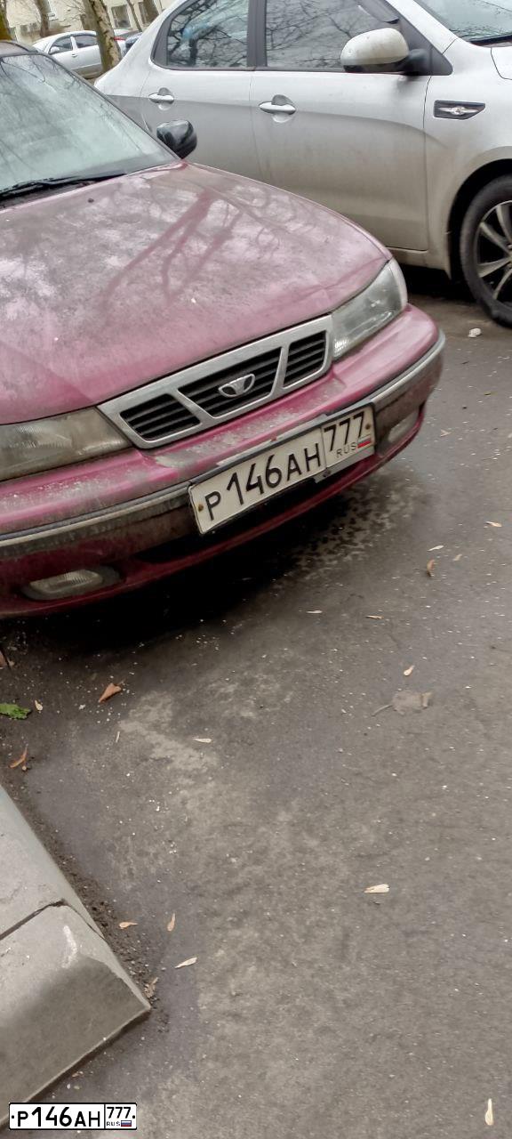 Фото автомобиля DAEWOO NEXIA, 2006 — госномер Т289МС977. Цвет: ВИШНЕВЫЙ