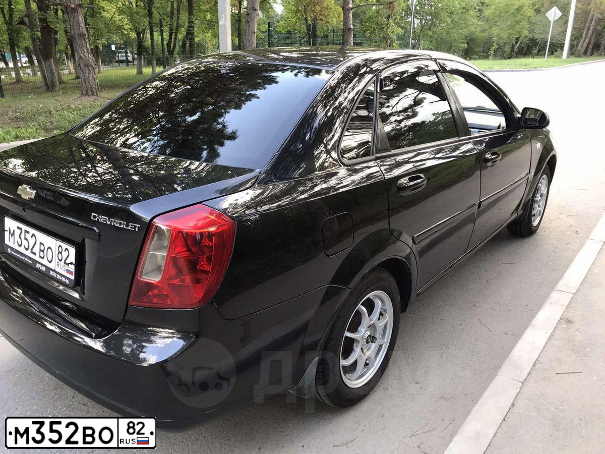 Фото автомобиля CHEVROLET LACETTI, 2009 — госномер М352ВО82. Цвет: ЧЕРНЫЙ