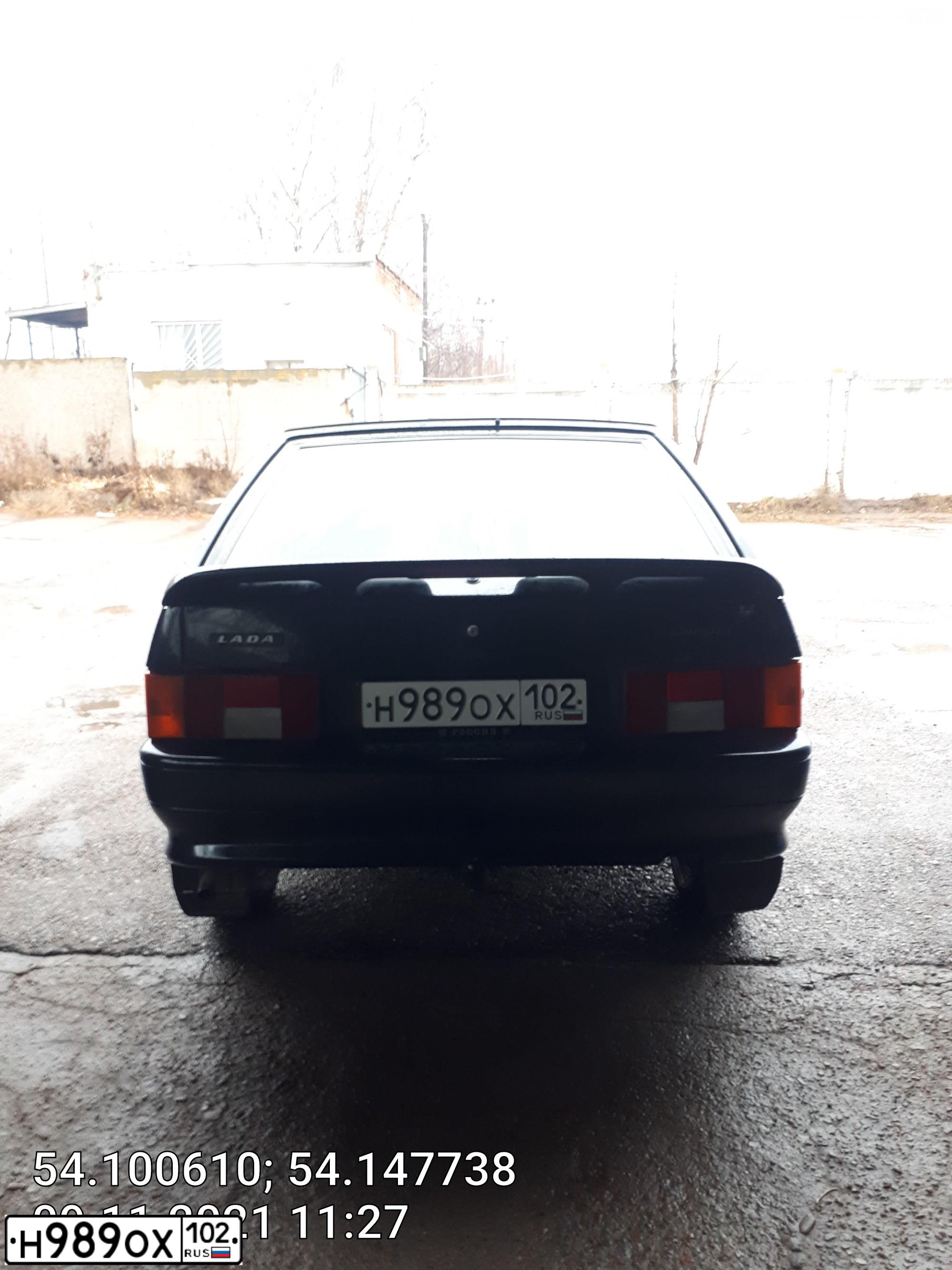 Фото автомобиля LADA 2114 SAMARA, 2009 — госномер Е586УЕ702. Цвет: ГРАФИТОВЫЙ МЕТАЛЛИК