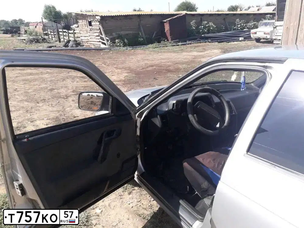 Фото автомобиля LADA 2112, 2001 — госномер Т677ОН57. Цвет: СЕРЕБРИСТО-БЕЛЫЙ