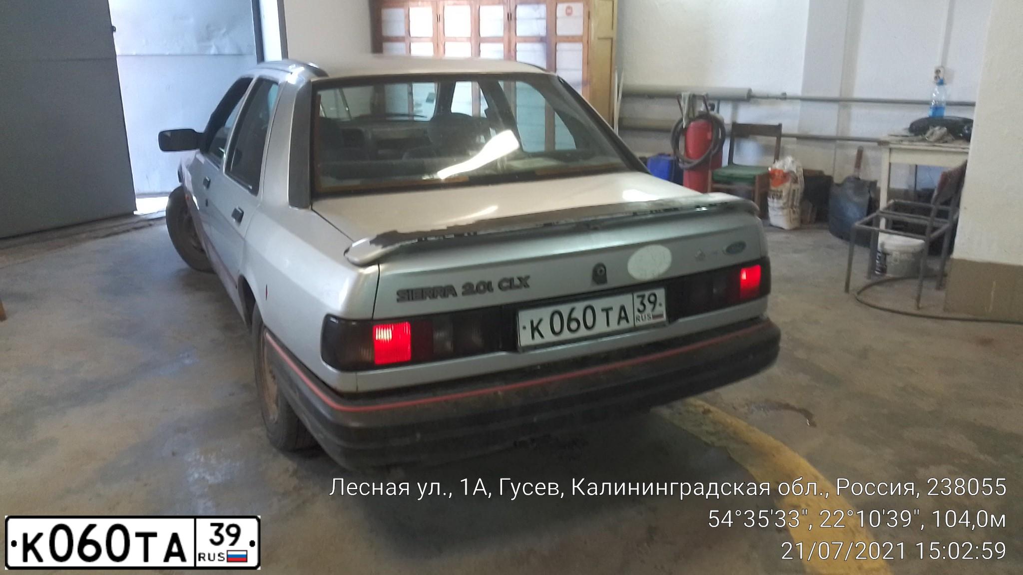 Фото автомобиля FORD SIERRA, 1990 — госномер К060ТА39. Цвет: СЕРЫЙ