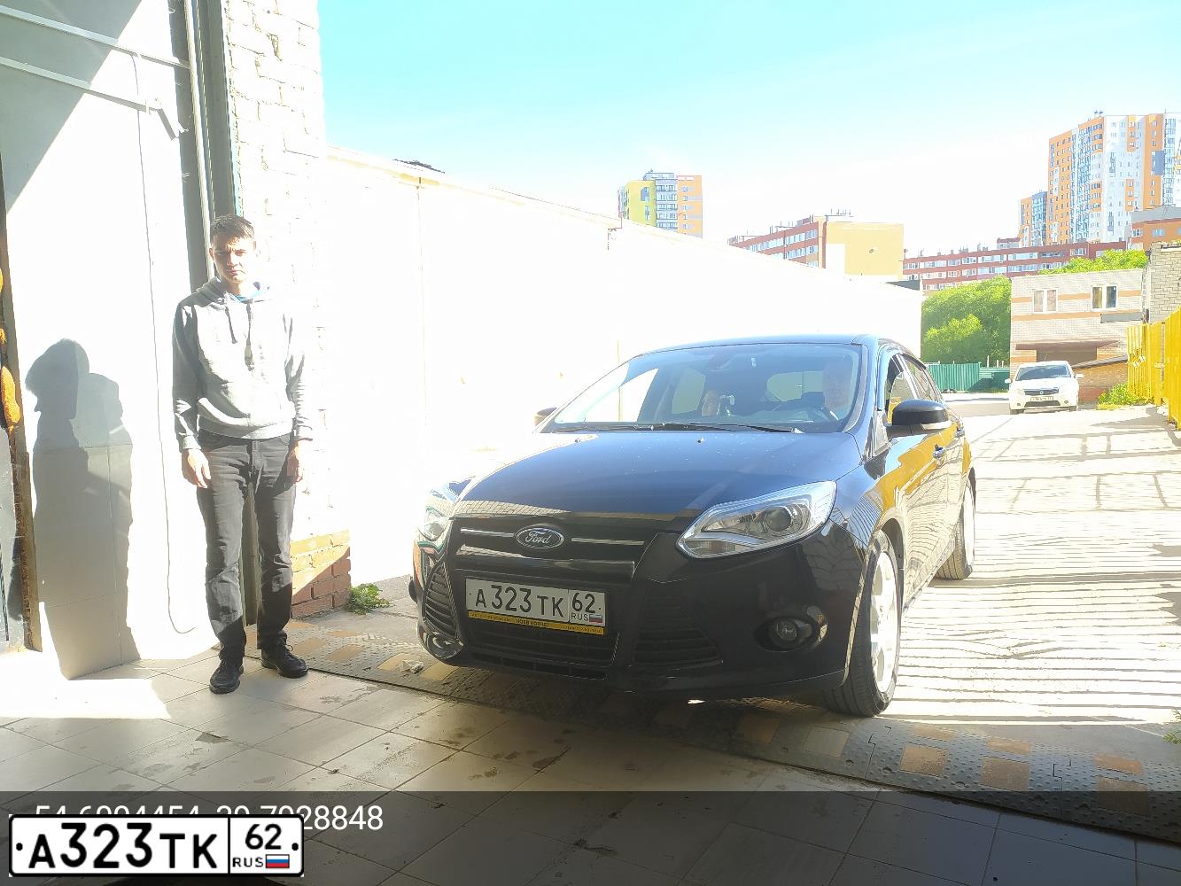 Фото автомобиля FORD FOCUS, 2015 — госномер А323ТК62. Цвет: ЧЕРНЫЙ