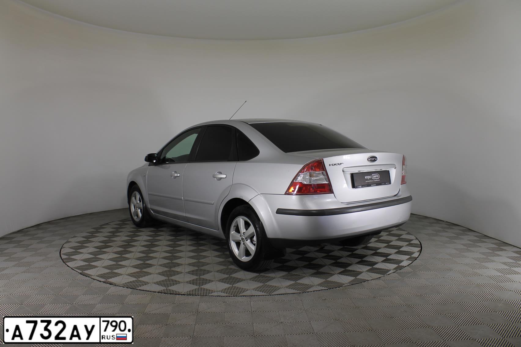 Фото автомобиля FORD FOCUS, 2007 — госномер В143АУ199. Цвет: Серебристый