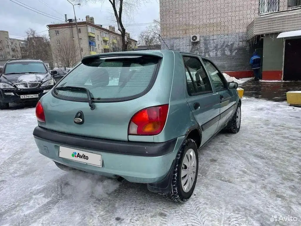 Фото автомобиля SSANGYONG KYRON, 2012 — госномер У374ТН750. Цвет: ЧЕРНЫЙ