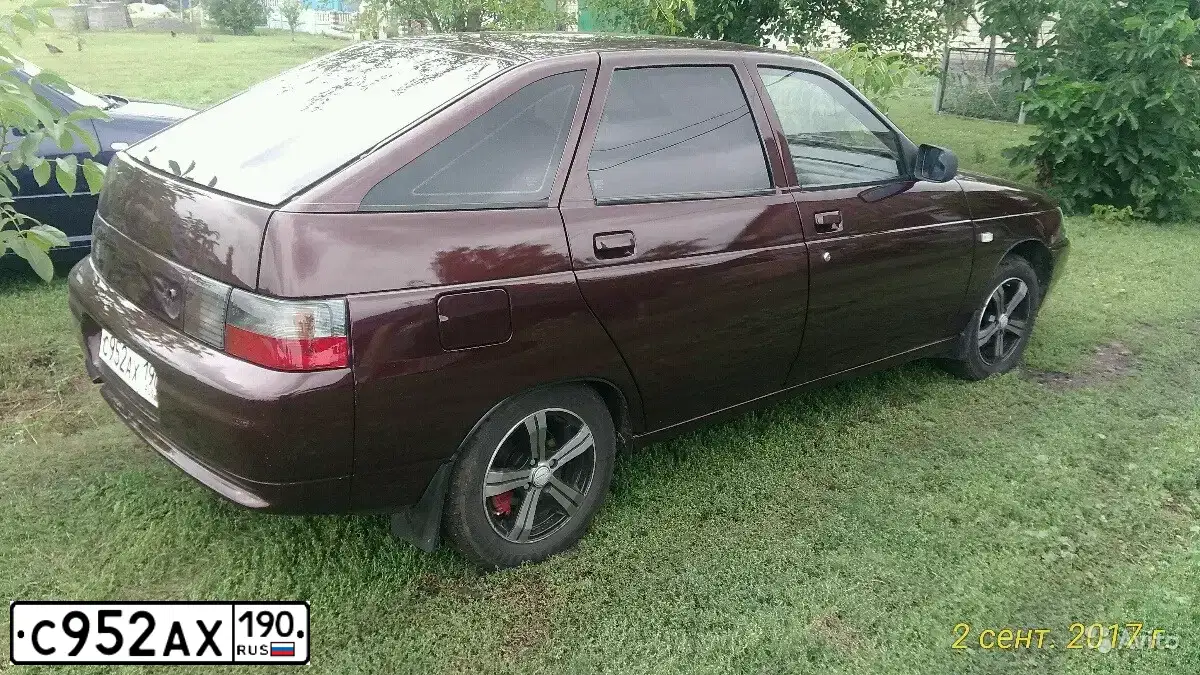 Фото автомобиля LADA 2112, 2003 — госномер С952АХ190. Цвет: Золотистый Красно-коричневый