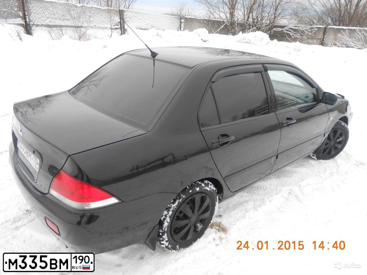Фото автомобиля MITSUBISHI LANCER, 2007 — госномер М239ТК69. Цвет: ЧЕРНЫЙ