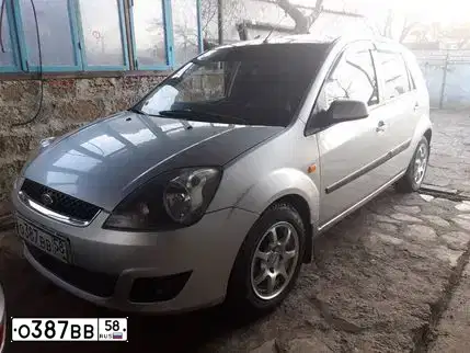 Фото автомобиля FORD FIESTA / ASPIRE, 2006 — госномер Н474КЕ58. Цвет: СЕРЕБРИСТЫЙ