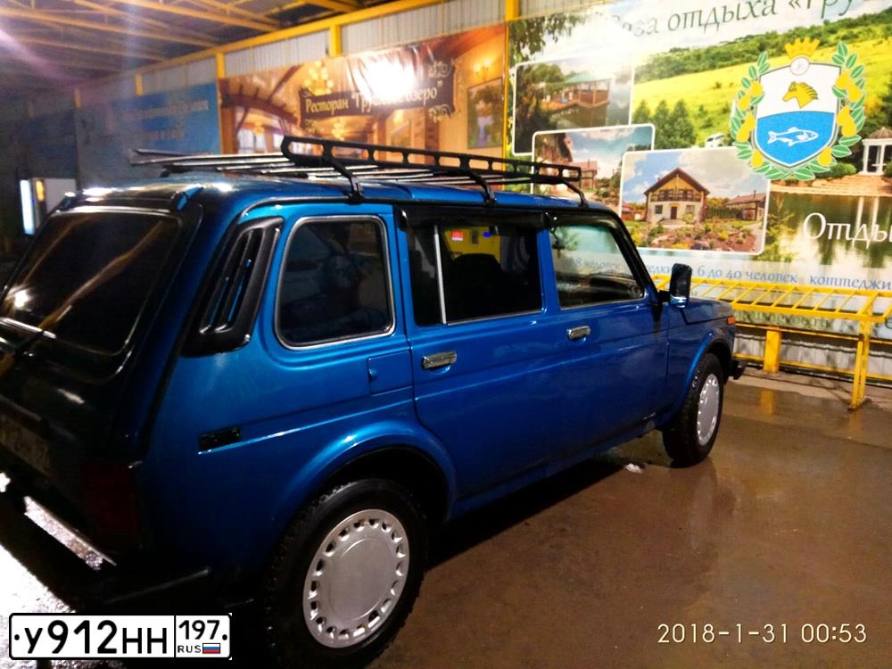 Фото автомобиля LADA 2131 NIVA, 1999 — госномер М365АН82. Цвет: синий
