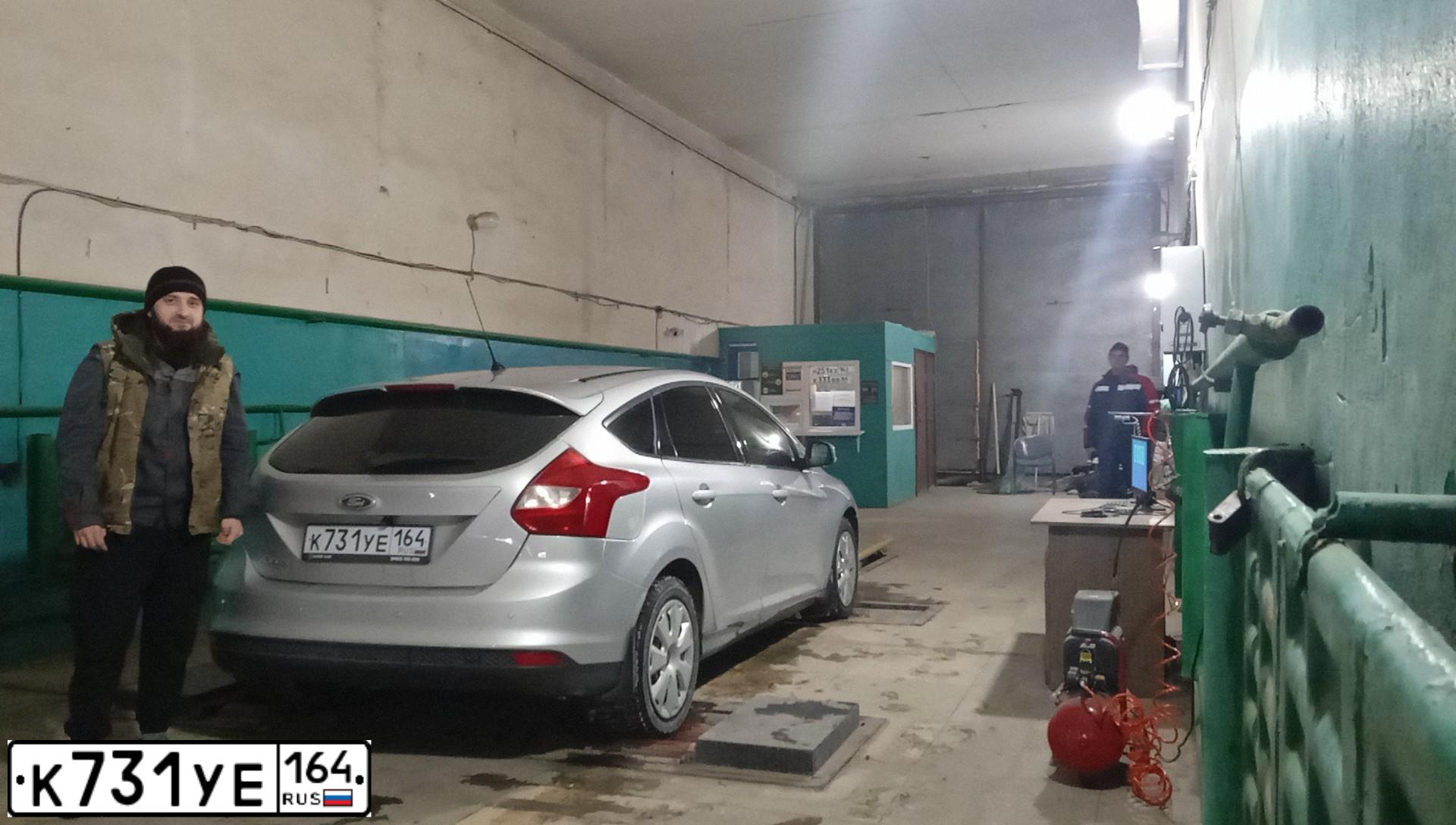 Фото автомобиля FORD FOCUS, 2011 — госномер К731УЕ164. Цвет: СЕРЕБРИСТЫЙ